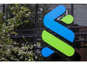 A logo at the Standard Chartered Plc headquarters in London, UK, on Tuesday, July 25, 2023. Standard Chartered is due to report first-half earnings on Friday, July 28. Photographer: Hollie Adams/Bloomberg