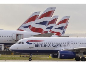 Passenger aircraft, operated by British Airways Plc, at Heathrow Airport Terminal 5, in London, UK, on Monday, Dec. 11, 2023. Saudi Arabia may ultimately gain majority control of London Heathrow Airport, Europe's busiest, as several shareholders consider the sale of their interests, the Times reported on Sunday.