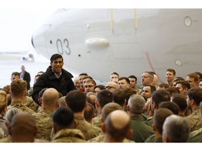 Rishi Sunak speaks to soldiers at the RAF Lossiemouth in Moray on December 18 in Lossiemouth, Scotland.