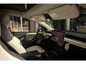 The interior of a Tesla Model Y electric vehicle at the company's showroom in New York.