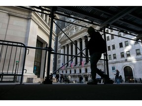 Pedestrians in front of the New York Stock Exchange (NYSE) in New York, US, on Friday, Feb. 16, 2024. Wall Street is ending the week on a bit of a sour note, with stocks and bonds falling after economic data continued to fuel speculation the Federal Reserve will be in no rush to cut interest rates.
