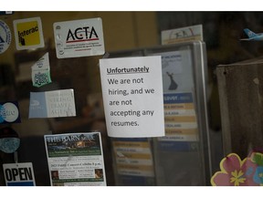 A sign informing job-seekers of no employment outside a store in Sydney, Nova Scotia.