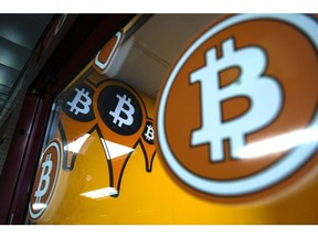 A Bitcoin logo on cryptocurrency automated teller machine (ATM) kiosk in Warsaw, Poland, on Thursday, March 14, 2024. Photographer: Damian Lemaski/Bloomberg