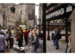 "Shopping" signage in New York, US, on Thursday, April 11, 2024. The US Census Bureau is scheduled to release retail sales figures on April 15. Photographer: Yuki Iwamura/Bloomberg