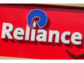 Signage for Reliance. Photographer: Dhiraj Singh/Bloomberg