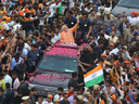  Indian Prime Minister Narendra Modi waves to a crowd while campaigning in Varanasi, India, April 25, 2019.  Modi is running for a third term as prime minister in general elections slated to be carried out over seven phases from April 19 until June 1.