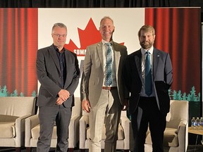 Alberta Minister of Affordability and Utilities Nathan Neudorf joins Emissions Reduction Alberta CEO Justin Riemer and X-energy Vice President of Global Business Development Ben Reinke for an announcement at the Small Modular Reactors Canada Summit.