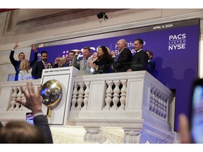 PACS Group, Inc.'s Jason Murray, Co-Founder, CEO and Chairman; and Mark Hancock, Co-Founder and Executive Vice Chairman, are surrounded by PACS executives, board members and family as they ring the closing bell at the New York Stock Exchange on Thursday, April 11, 2024. Images of NYSE Group, Inc., including the images of the New York Stock Exchange Trading Floor and the Façade of the New York Stock Exchange, the design of each of which is a federally registered service mark of NYSE Group, Inc., are used with permission of NYSE Group, Inc. and its affiliated companies. Neither NYSE Group, Inc. nor its affiliated companies sponsor, approve of or endorse the contents of this website. Neither NYSE Group, Inc. nor its affiliated companies recommend or make any representation as to possible benefits from any securities or investments. Investors should undertake their own due diligence regarding their securities and investment practices.