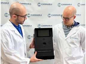 Figure 1. Breath Logix Industrial Series device and Cannabix engineers