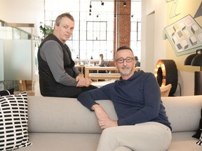 Ian Chalmers, Principal, Research, Creative & Design Director of Pivot Design Group (left) and Peter Scott Principal and Founder of Q30 Design Inc. are photographed in their shared office space in Toronto, on Thursday, April 4, 2024.THE CANADIAN PRESS/Chris Young