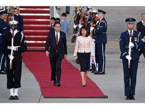 Japanese Prime Minister Fumio Kishida and his spouse Yuko Kishida arrive at Joint Base Andrews in Maryland, on April 8. Photographer: Olivier Douliery/AFP/Getty Images