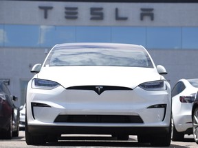 A 2023 Model X sports-utility vehicle outside a Tesla Inc. dealership in Englewood, Colo.
