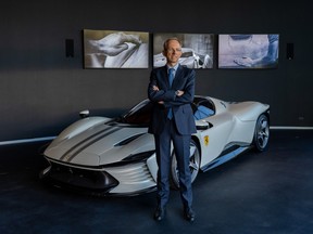 Benedetto Vigna, CEO of Ferrari NV, in front of a Ferrari Daytona SP3 sports car at the company headquarters in Maranello, Italy, 2023.
