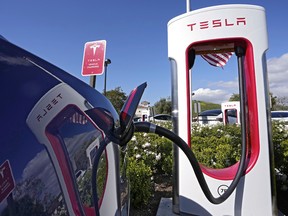 Elon Musk fires Tesla's entire supercharger team | Financial Post