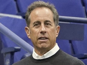 FILE - Jerry Seinfeld is shown before the men's singles final of the U.S. Open tennis championships between Casper Ruud, of Norway, and Carlos Alcaraz, of Spain, Sunday, Sept. 11, 2022, in New York. Seinfeld's upcoming Netflix comedy will be featured during this weekend's IndyCar race at Long Beach as rookie Linus Lundqvist will drive a car painted to look like a Pop-Tart in recognition of the movie "Unfrosted."
