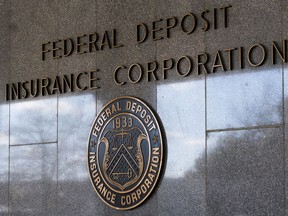 FILE - The Federal Deposit Insurance Corporation (FDIC) seal is shown outside its headquarters, March 14, 2023, in Washington. Regulators have closed Republic First Bank, a regional lender operating in Pennsylvania, New Jersey and New York. The FDIC said Friday, April 26, 2024, it had seized the Philadelphia-based bank, which had roughly $6 billion in assets and $4 billion in deposits as of Jan. 31.