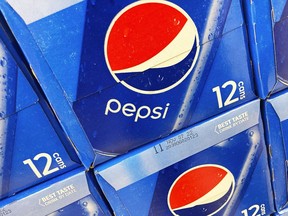 FILE - Boxes of Pepsi are displayed in a grocery store, Ill., Thursday, Feb. 10, 2022. PepsiCo reports earnings on Tuesday, April 23, 2024.