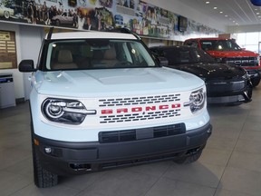 File -A Ford Bronco is displayed at a Gus Machado Ford dealership on Jan. 23, 2023, in Hialeah, Fla. The U.S. government's auto safety agency has opened an investigation, Friday, April 12, 2024, into a Ford recall for gasoline leaks from cracked fuel injectors that can cause engine fires, saying in documents that the remedy doesn't fix the leaks.