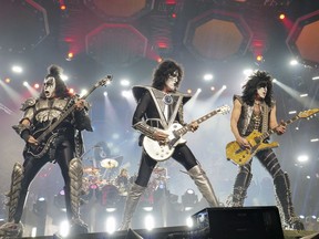 FILE - Gene Simmons, from left, Tommy Thayer, and Paul Stanley of KISS perform during the final night of the "Kiss Farewell Tour"at Madison Square Garden in New York on Dec. 2, 2023.