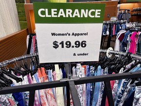 A clearance sign is displayed at a retail clothing store in Downers Grove, Ill., Monday, April 1, 2024. On Friday, April 26, 2024, the Commerce Department issues its March report on consumer spending.