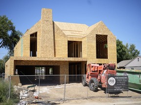 FILE - A new home under construction is seen, Aug. 21, 2023, in southeast Denver. On Thursday, April 11, 2024, Freddie Mac reports on this week's average U.S. mortgage rates.
