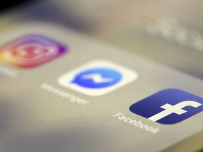 FILE - Social media applications are displayed on an iPhone, March 13, 2019, in New York. In a lawsuit filed Tuesday, April 9, 2024, two tribal nations accused social media companies -- including Facebook and Instagram's parent company Meta Platforms; Snapchat's Snap Inc.; TikTok parent company ByteDance; and Alphabet, which owns YouTube and Google -- of contributing to the disproportionately high rates of suicide among Native American youth.