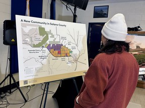 FILE - A map of a new proposed community in Solano County, Calif., is displayed during a news conference in Rio Vista, Calif. on Jan. 17, 2024. The Silicon Valley-backed campaign to build a new city in California for up to 400,000 people said Tuesday, April 30, 2024, it has submitted enough signatures to qualify an initiative for the November election.