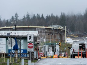 An entrance gate to a construction site at the Trans Mountain Pipeline expansion project at the Burnaby Terminal.