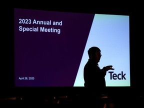 A journalist is silhouetted before the Teck Resources special meeting of shareholders, in Vancouver, B.C., Wednesday, April 26, 2023. Teck Resources Ltd. reported its first-quarter profit fell compared with a year ago due in part to its reduced ownership in its steelmaking coal business as well as lower copper and zinc prices and higher costs.THE CANADIAN PRESS/Darryl Dyck
