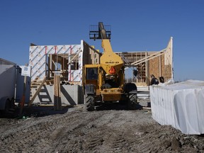 Canada Mortgage and Housing Corp. says the annual pace of housing starts in March declined seven per cent compared with February. Work continues at a new housing development in Belleville, Ont., on Friday, March 1, 2024.