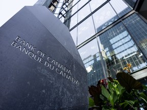 The Bank of Canada building is shown in Ottawa on Wednesday, September 6, 2023. Members of the Bank of Canada's governing council were split on how long the central bank should wait before it starts cutting interest rates when they met earlier this month.