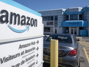 A Quebec-based union says it has filed an application to represent hundreds of Amazon workers at a warehouse in the province. The Amazon DXT4 warehouse is seen in Laval, Que., Monday, April 22, 2024.