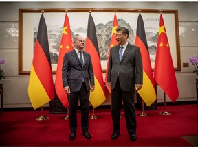 Olaf Scholz with Xi Jinping in Beijing on April 16. Photographer: Michael Kappeler/picture alliance/Getty Images