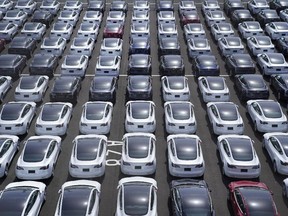 Tesla vehicles in a parking lot after arriving at a port in Yokohama, Japan.