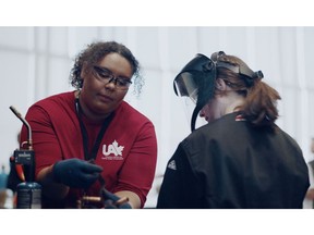 A student visitor participates at UA Canada's Try-A-Trade® and Technology activity at SCNC Winnipeg 2023.
