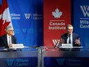 Jerome Powell, chair of the U.S. Federal Reserve, left, and Tiff Macklem, governor of the Bank of Canada, speak during a fireside chat at the Wilson Center in Washington, D.C., on Tuesday, April 16, 2024.