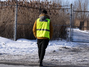 Security guards the entrance to the construction site of the new EV battery plant, Northvolt, in Saint-Basile-le-Grand, east of Montreal, Quebec, Friday, Jan. 19, 2024.