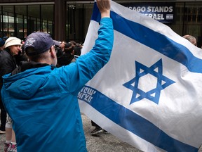 Supporters of Israel attend an Israeli Independence Day celebration in Daley Center Plaza on May 14, 2024 in Chicago, Ill.