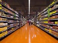People shop at a Loblaws store in Toronto on Thursday, May 3, 2018.