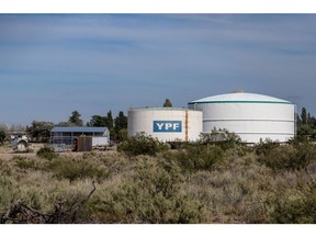 Storage tanks at a YPF SA facility in Plaza Huincul, Neuquen province, Argentina, on Tuesday, March 2, 2021. YPF, Argentina's state-run oil company, needs to come up with more than $1 billion to spur drilling in Patagonia, where it's leading development of the biggest shale patch outside the U.S.