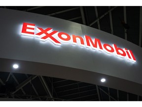 Signage for Exxon Mobil Corp. at the company's booth during the Gastech Exhibition & Conference in Singapore, on Tuesday, Sept. 5, 2023. The conference runs though Sept. 8. Photographer: Nicky Loh/Bloomberg