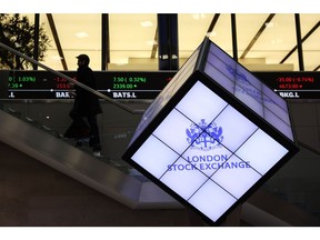 The logo of London Stock Exchange Group Plc in the company's office atrium in the City of London, UK, on Wednesday, Jan. 3, 2024. The FTSE 100, launched on Jan. 3, 1984, was one of many innovations that transformed the City of London in the 1980s. Photographer: Hollie Adams/Bloomberg