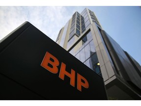 The BHP Group Ltd. logo outside Brookfield Place in Perth, Australia, on Thursday, April 25, 2024. BHP proposed a takeover of Anglo American Plc that values the smaller miner at £31.1 billion ($38.8 billion), in a deal that would catapult the combined company's copper production far beyond its rivals while sparking the biggest shakeup in the industry in over a decade. Photographer: Philip Gostelow/Bloomberg