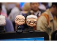 Bobbleheads depicting Berkshire Hathaway CEO Warren Buffet and former Vice Chairman Charlie Munger during a shareholders shopping day ahead of the Berkshire Hathaway annual shareholders meeting in Omaha, Nebraska, US, on Friday, May 3, 2024. The firm will report first-quarter results before the meeting kicks off on Saturday, with analysts predicting its collection of insurance businesses and a robust economy will help boost profit.