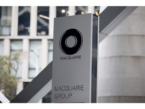 Signage for Macquarie Group Ltd. outside the company's office in Sydney, Australia, on Wednesday, May 1, 2024. Macquarie Group is scheduled to report its half-year earnings results on May 3. Photographer: Brent Lewin/Bloomberg