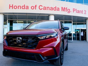 A Honda CRV Hybrid is parked outside the Honda of Canada Manufacturing Plant 2 in Alliston, Ontario. The Japanese auto giant recently announced a $15 billion investment in electric vehicle manufacturing in the province.