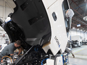 A Lion 6 electric truck is assembled at the Lion Electric Company assembly plant in Saint-Jerome, Que., Aug. 21 2023.