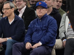 New York Mets owner Steve Cohen watches during the first half of an NBA basketball game between the New York Knicks and the Sacramento Kings on Thursday, April 4, 2024, in New York.
