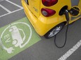 A electric vehicle charging at a parking lot in Tsawwassen, near Vancouver, B.C.