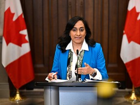 President of the Treasury Board Anita Anand speaking during a news conference in the Foyer of the House of Commons on Parliament Hill in Ottawa.